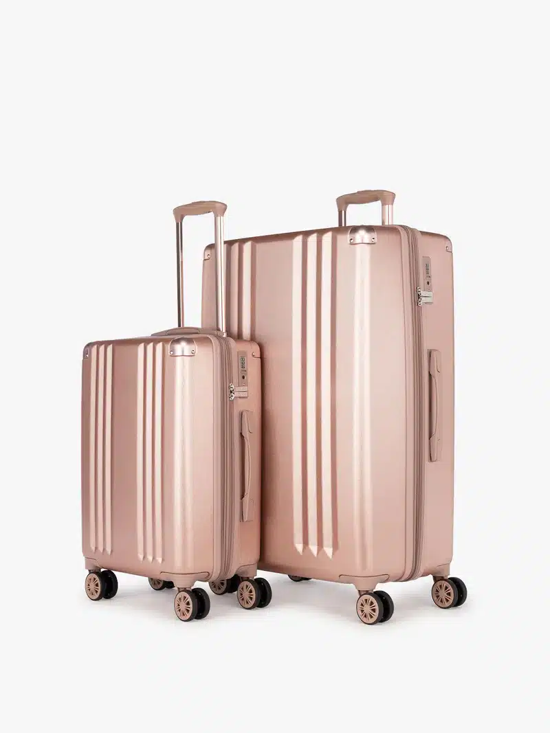 Calpack rose gold suitcases